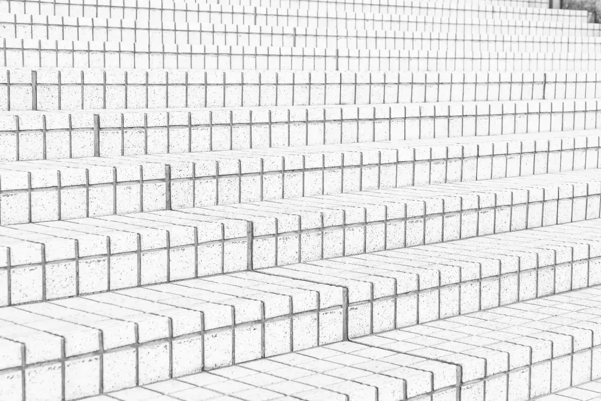 Ascending steps showing the order to build a business tech stack