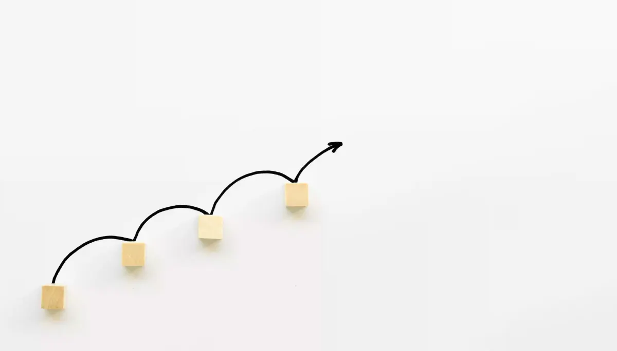 Ascending steps marking where a business outgrows off-the-shelf software